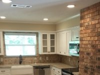 115 Baseline - Here is the reight side of the kitchen with new windows in the house, modified cabinets for farmers sink and some new glass doors, new paint, counters, backsplash and appliances.