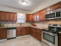 Work triangle of kitchen.  We changed the configuration to allow a slide in range in place of the old cooktop.  Redesign was our recomendation.