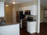 Existing cabinets were repaired, new doors and drawer fronts were installed, Cabinets were painted and new light fixtures and flooring was installed.